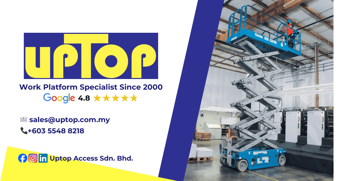 Indoor mobile aerial work platform scissor lift in warehouse setting.
