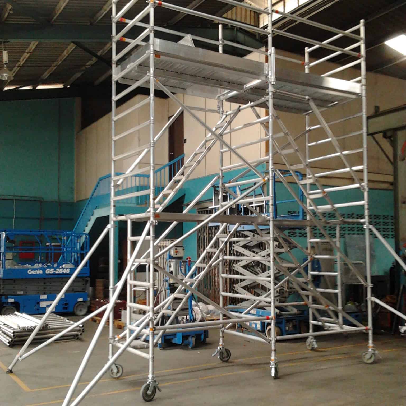 Mobile aluminium scaffold tower with platforms for safe access.